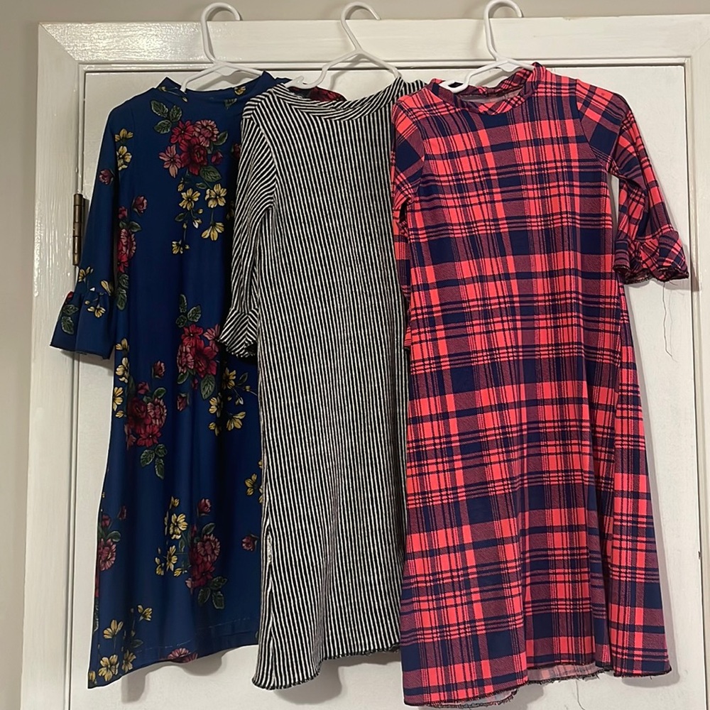 Three custom toddler dresses